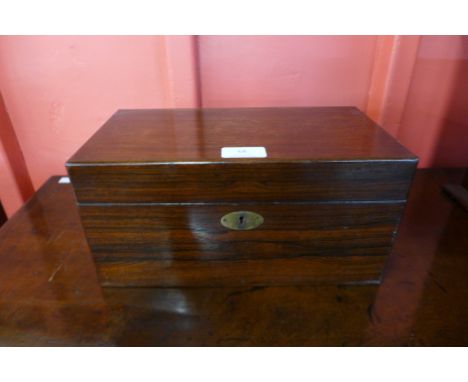 A Victorian rosewood tea caddy