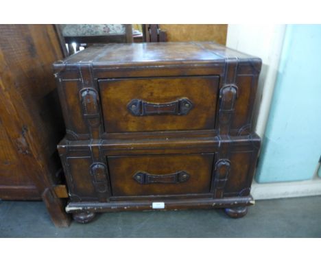 A faux leather trunk style chest