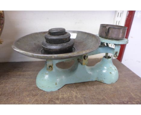 A set of metal kitchen scales