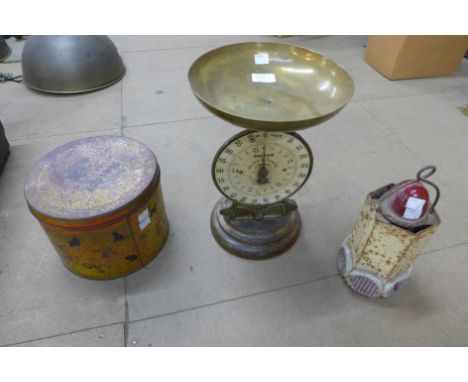 A set of Salter bank silver and copper coin scales, a vintage Carsons tin and a vintage industrial lantern