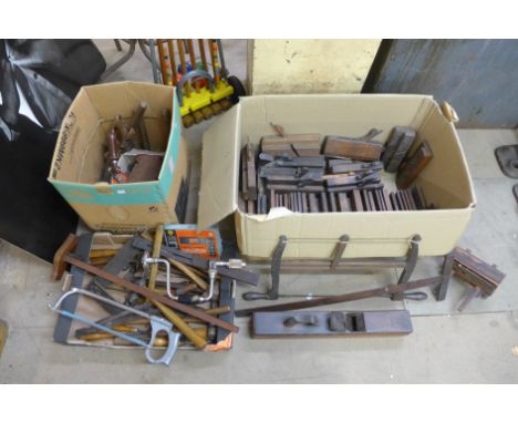 Two boxes of vintage carpenters tools, including planes, drills, etc.