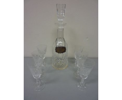 Waterford cut crystal sherry decanter together with a hallmarked silver decanter label H34cm and six Waterford cut crystal gl