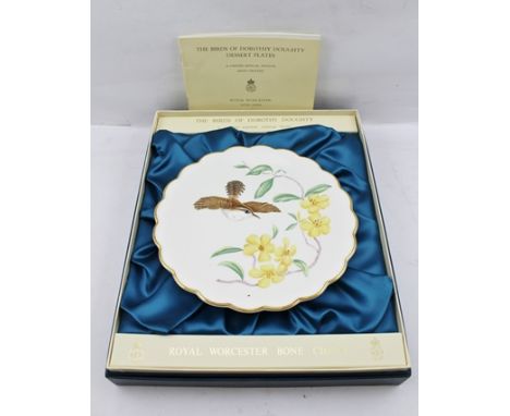 "THE BIRDS OF DOROTHY DOUGHTY", A LIMITED EDITION SET OF TWELVE ROYAL WORCESTER HAND-PAINTED BONE CHINA PLATES, with booklets