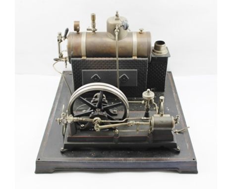 A DOLL GERMAN LIVE STEAM STATIONARY STEAM PLANT, c.1925, spirit fired horizontal boiler fitted with burner, pressure gauge li