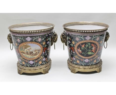A PAIR OF 20TH CENTURY SUBSTANTIAL CERAMIC PLANTERS, with decorative brass mounts & goat mask ring handles, 50cm high x 50cm 
