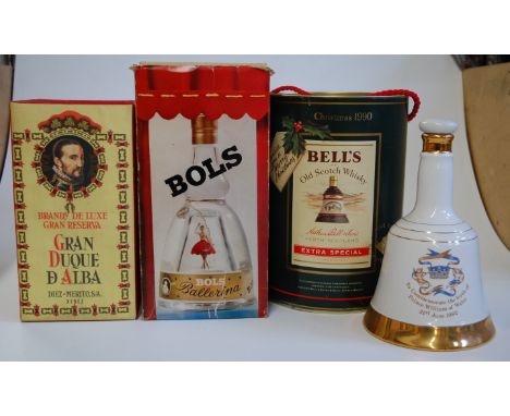A Bell's commemorative Scotch Whisky decanter in carton, Christmas 1990; one other Bell's commemorative example for the birth