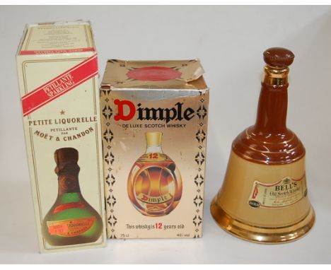 Haig's Dimple aged 12 years, two bottles in cartons; two Bell's Wade Scotch Whisky decanters (only); together with seven Moët