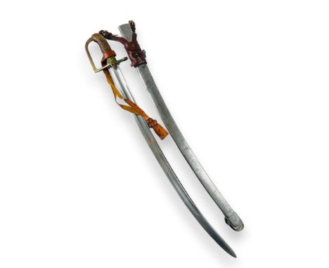 The blade of the sabre is steel, with visible grooves and double fullers on both sides. The spine of the blade shows a deep t