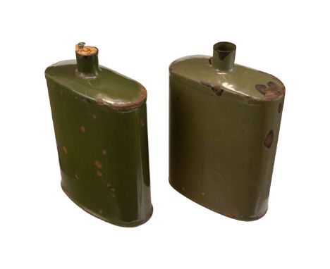 Two British Canteens from WWII. Enamel slightly damaged. One canteen has a stopper. Overall condition as shown in the picture