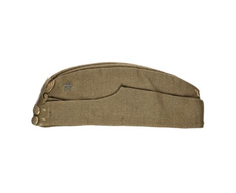 A British-style forage cap worn by a second lieutenant in the Polish Armed Forces in the West. On the side, a star is embroid