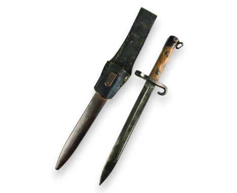 Austrian Bayonet for the Mannlicher Carbine, with a steel blade featuring fullers on both sides and a marked tang near the cr