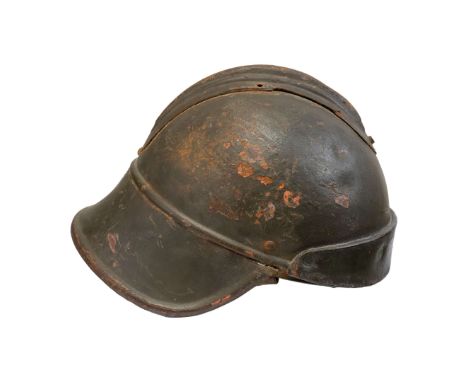 A unique headgear used by Polish armored units, this is a modified Adrian helmet with a long neck guard (Model 15/35). The Po