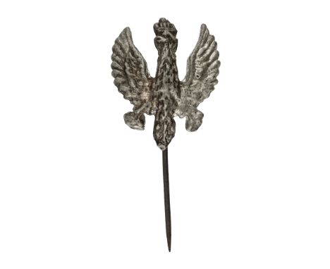 Patriotic pin in the shape of a small eagle, attached with a pin fastening.Dimensions: Pin length - 20 mm, eagle - 15 mm x 13