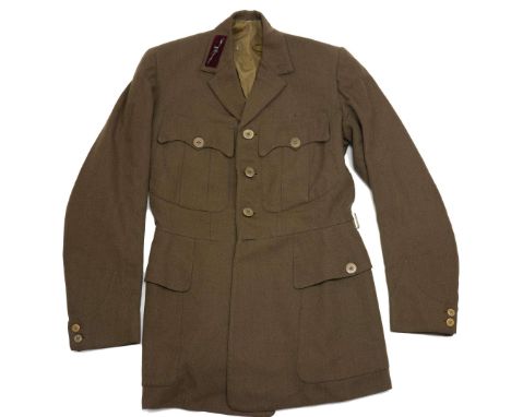 A "French-style" officer's jacket of the Latvian Army from the interwar period. The jacket features one epaulette on the coll