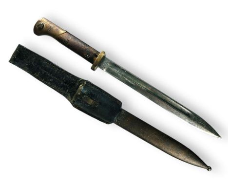 Bayonet with a single-edged blade, featuring a double-edged concave fuller. The bayonet's tang is single-sided. The handle ha