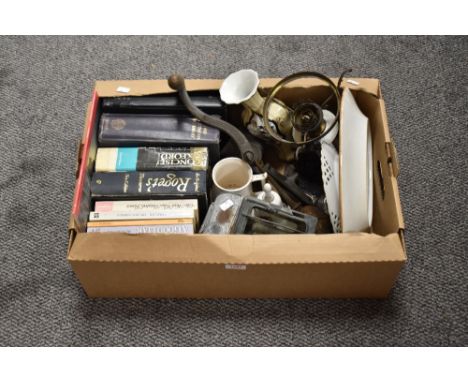 An assortment of items including a selection of books, a very vintage long nosed oil can and a large oval platter plate etc.