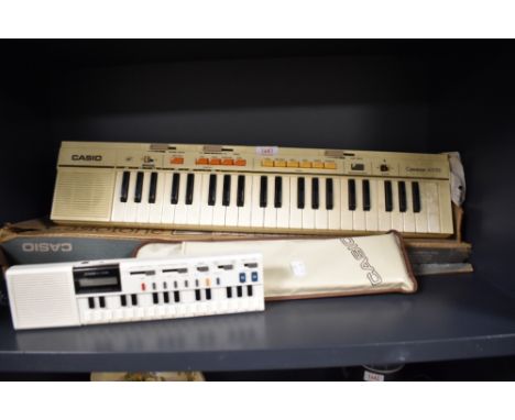 Two electronic musical instruments including a Casiotone MT-35 and a smaller Casio VL-Tone.