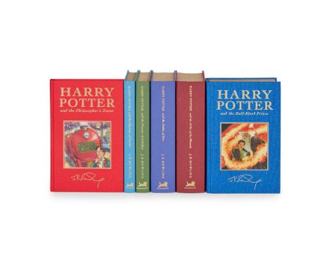 Rowling, J. K.  (1965-) Deluxe set of the Harry Potter books, inscribed in each volume comprising: Harry Potter and the Philo