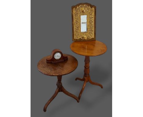 A 19th Century mahogany pedestal table together with a similar elm pedestal table, a brass mounted table mirror and a mantle 