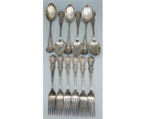 A set of six Victorian silver table forks together with a set of six matching table spoons, Sheffield 1893, maker George Edwa