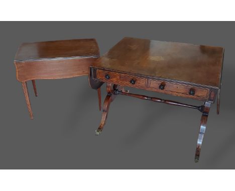 A Regency Mahogany line inlaid drop flap sofa table with twin end supports together with a mahogany pembroke table 