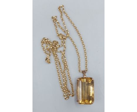 A 9ct gold pendant set with a large rectangular Citrine with linked chain, 19.7gms inclusive