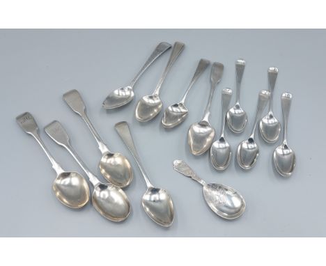 A Victorian silver caddy spoon, Birmingham 1900 together with thirteen silver teaspoons, 7ozs