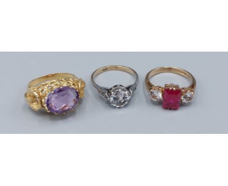 A 9ct gold dress ring together with two similar 9ct gold dress rings, 10.3gms