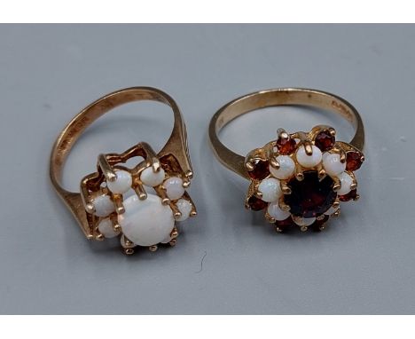 A 9ct gold Opal set cluster ring together with another similar ring set opals and garnets, 6.2gms