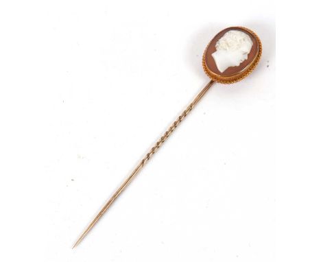 A cameo stick pin, the oval shell cameo, carved with a bust of a gentleman, collet mounted with rope twist border, 18mm wide,