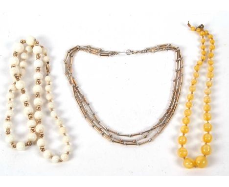 A silver bead necklace, the mix of bugle and round beads with tag to one end hallmarked London 2003, with lobster clasp stamp