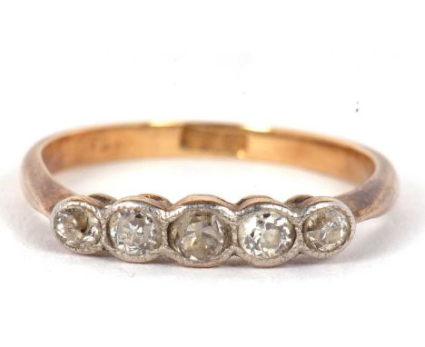 A five stone diamond ring, the five slightly graduated old European cut diamonds in millegrain mounts, with plain band indist