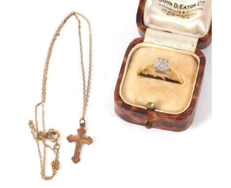 An 18ct and platinum ring and a 9ct cross necklace, the ring set with a square plaque with single cut diamonds, with plain ba