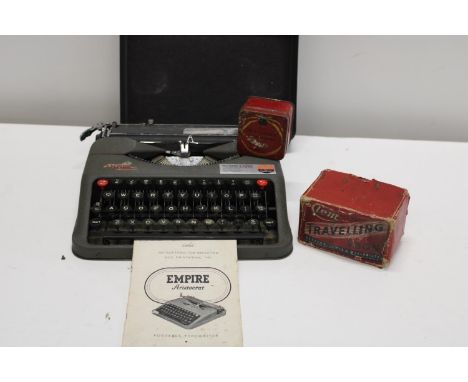 A vintage Empire portable typewriter &amp; other items.  Postage unavailable 