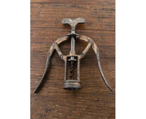 A James Heeley's 1888 'A1' bronze finish double lever corkscrew, Patent no 6006 advertising Big Ben Scotch on one side of the