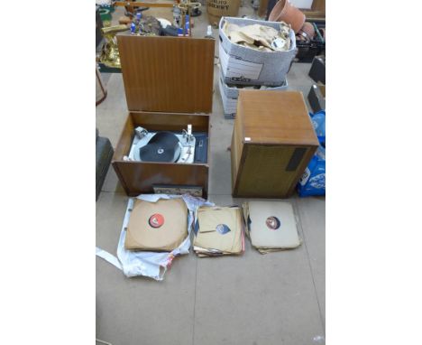 An H.M.V. Garrard record player with speaker and various records 