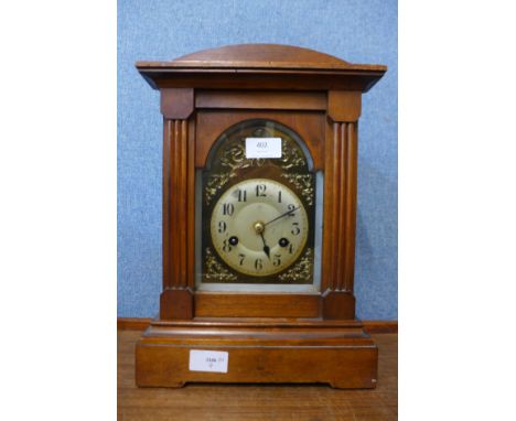 An early 20th Century beech mantel clock 