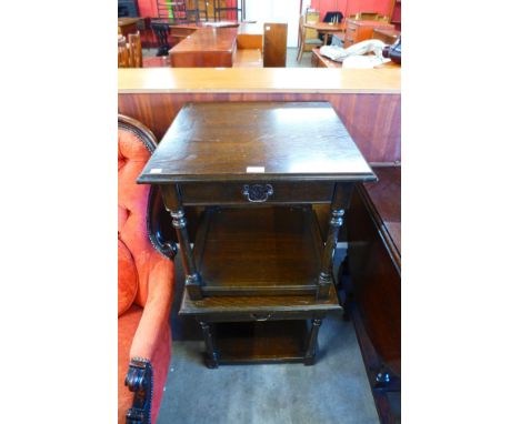A pair of oak single drawer lamp tables 