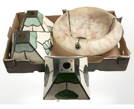 An Art Deco mottled glass pendant ceiling light shade, diameter 35 cm, and three Tiffany style leaded glass shades. (1 box)