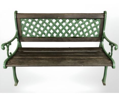 A Berkeley Forge painted cast iron and teak garden bench, width 128 cm 