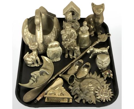 A group of brass wares including swan planter, owl and cat ornaments, bell, shoe horns, etc.