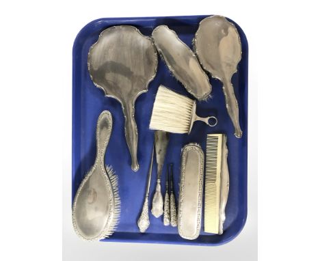 A group of silver mounted dressing table brushes, mirror, button hooks, etc.