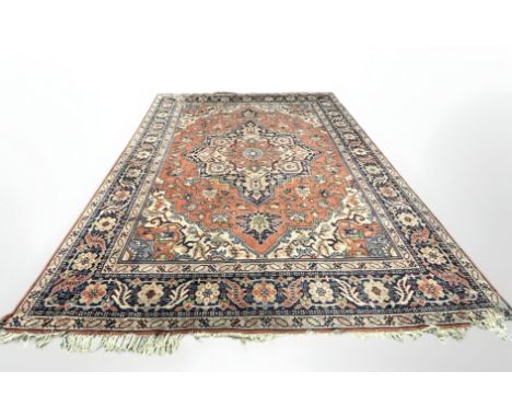 A 20th century carpet of Heriz design, 405cm by 290cm