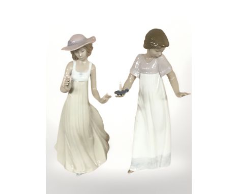 Two Nao figurines, numbers 1155 and 1158, both boxed.