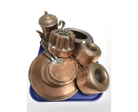 A group of copper jelly moulds, skillets, coffee percolator, etc.
