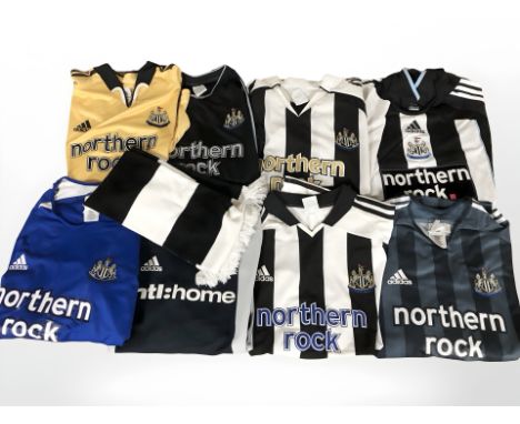 A group of Newcastle United Northern Rock football shirts, a further scarf. (1 box)