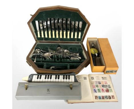 A canteen of stainless steel cutlery, Stanley hand drill, stamp album and a Hohner Melodica piano 