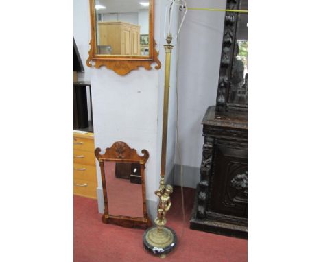 XIX Century Gilded Brass Standard lamp, with a cherub holding a Corinthian column, on circular marble base.