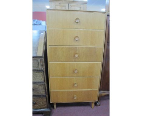 Meredew 1960's Light Oak Chest of Drawers, with six small drawers on tapering circular feet, 61cm wide.