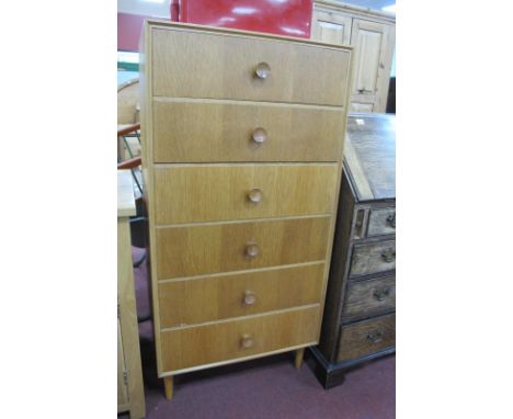 Meredew 1960's Light Oak Chest of Drawers, with six small drawers on tapering circular feet, 61cm wide.